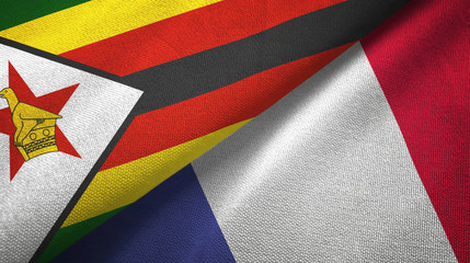 Zimbabwe and France two flags textile cloth, fabric texture
