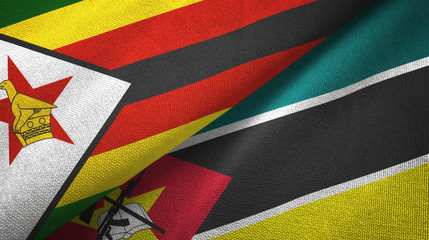 Zimbabwe and Mozambique two flags textile cloth, fabric texture