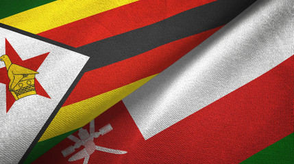 Zimbabwe and Oman two flags textile cloth, fabric texture