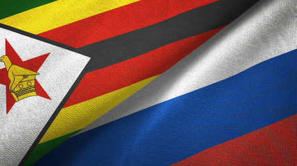 Zimbabwe and Russia two flags textile cloth, fabric texture
