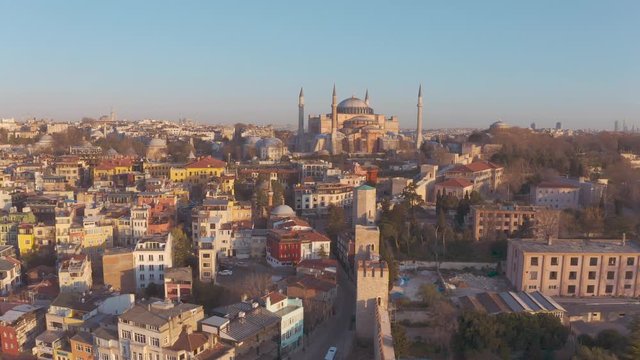 Drone video of Istanbul Turkey in the Sultanahmet area with touristic mosques (hagia Sophia, aya sofia, blue mosque and the bosphorus with a view to the European and Asean sides on a sunny morning.