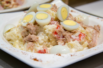  tuna mixed salad in white bowl