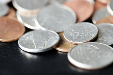 American cents on a dark surface close up