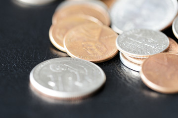 American cents on a dark surface close up