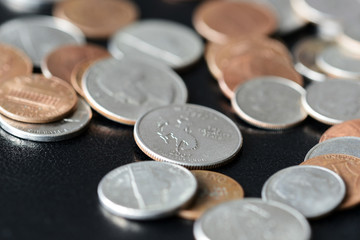 American cents on a dark surface close up