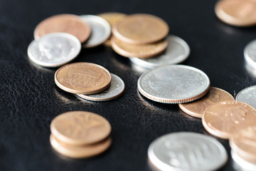 American cents on a dark surface close up