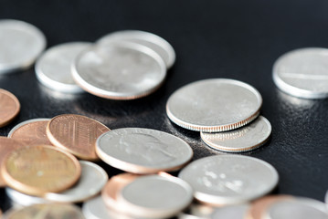 American cents on a dark surface close up