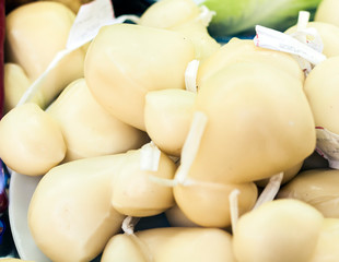 Italian cheese caciocavallo on the market in Catania, Sicily, Italy .
