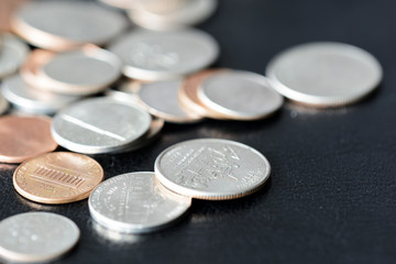 American cents on a dark surface close up