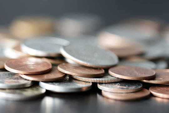 American cents on a dark surface close up