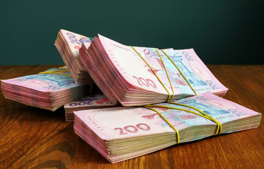 Ukrainian currency hryvnia UAH on the desk.