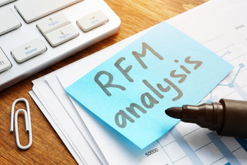 RFM analysis handwritten on a piece of paper and report.