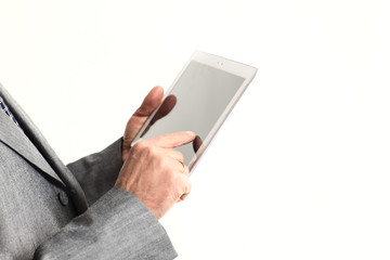 close up.businessman pointing finger at the digital tablet screen.isolated on white background