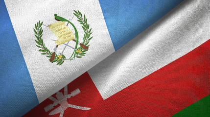 Fototapeta premium Guatemala and Oman two flags textile cloth, fabric texture