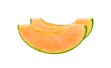slice of japanese melons, orange melon or cantaloupe melon with seeds isolated on white background