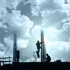 Construction workers in preparation for binding rebar , heavy industry concept