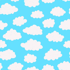 Seamless pattern with blue sky and cute cartoon clouds