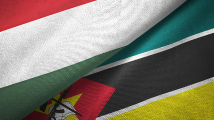 Hungary and Mozambique two flags textile cloth, fabric texture