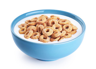 Bowl with corn rings, milk, yogurt isolated on white background.