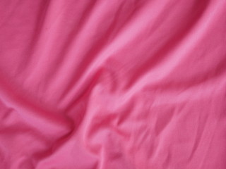 red silk fabric background, cotton cloth texture, pink sportswear