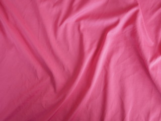 red silk fabric background, cotton cloth texture, pink sportswear
