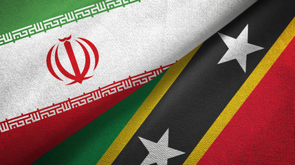 Iran and Saint Kitts and Nevis two flags textile cloth, fabric texture