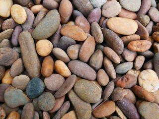 beauty pebbles on the beach stone background
