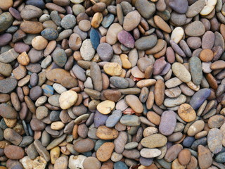 beauty pebbles on the beach stone background