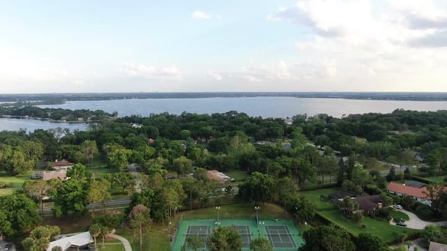 View Over a Lakeside Park Revealing Beautiful Lake in the Evening