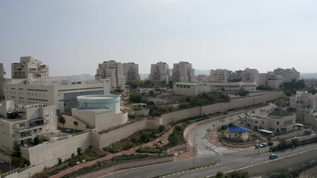 Israel, Modi'in city fly over, desert mountain background view, drone shot