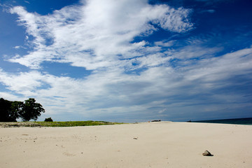 The white sand beach  in Andaman sea with  blue sky background in summer.