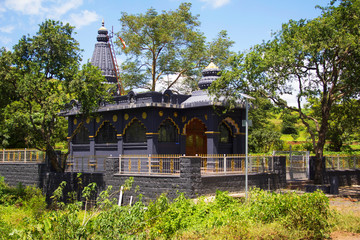 Fototapeta na wymiar A beautiful hindu temple in black stone at Mandvi Khurd, Pune district.