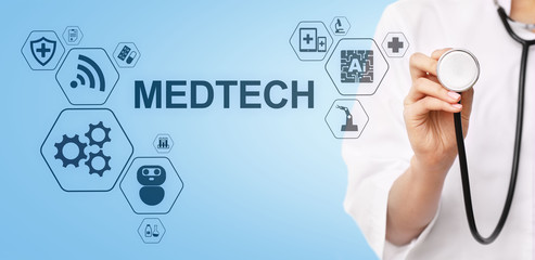 Medtech medical technology information integration internet big data concept on virtual screen. Doctor with stethoscope.