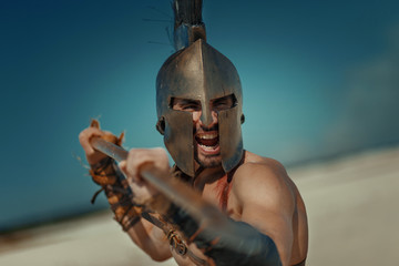 Male athlete in the armor of an ancient warrior