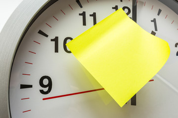 paper stick on clock for notice something with white background