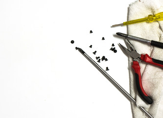 Screwdriver,pliers and other on white background with copy space.