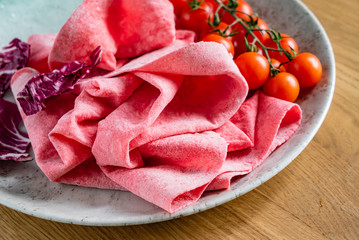 Lavash with tomatoes (soft, thin unleavened flatbread)