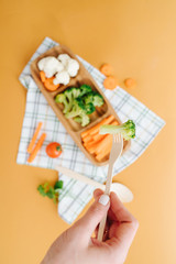 Broccoli on a wooden fork