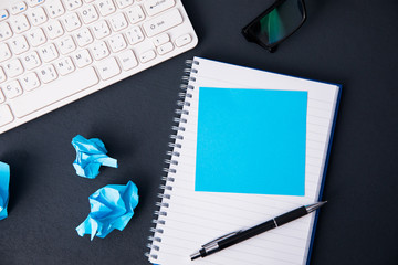 page on notepad with keyboard