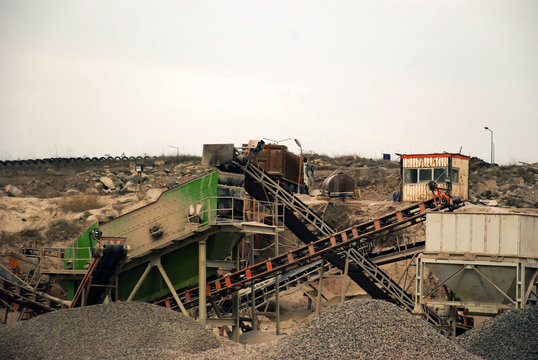 Stone pit quarry with conveyors and rock crackers