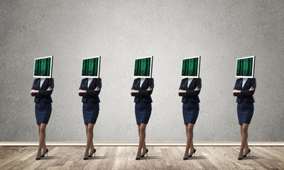 Business women with monitors instead of head.