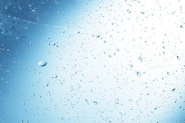 wet glass background condensate / abstract rain, drops texture on transparent glass