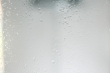 wet glass background condensate / abstract rain, drops texture on transparent glass