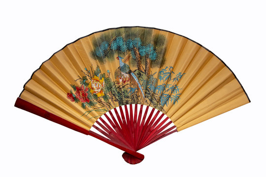 Large yellow wooden Chinese fan, weaved on white background, isolate