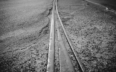 Old rail lines on road surface