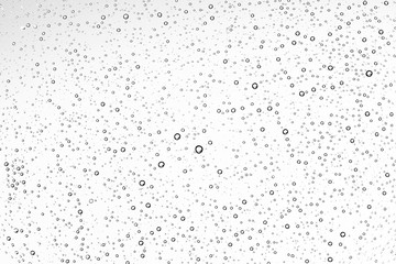 white isolated background water drops on the glass / wet window glass with splashes and drops of water and lime, texture autumn background