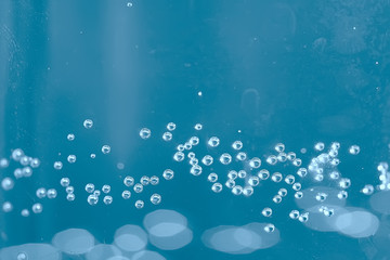 air bubbles in water macro background / blue background abstract bubbles in water