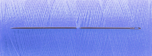 Blue threat with needle