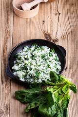 Obraz na płótnie Canvas White rice with spinach, plant based meal