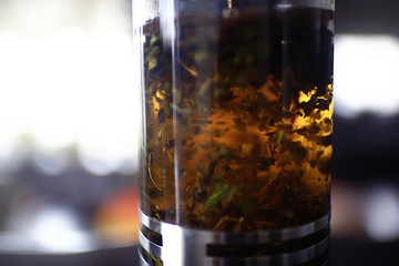 English tea in a cafe / cup and kettle with five o'clock tea